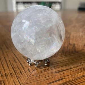 Cute miniature clear quartz sphere on stand
